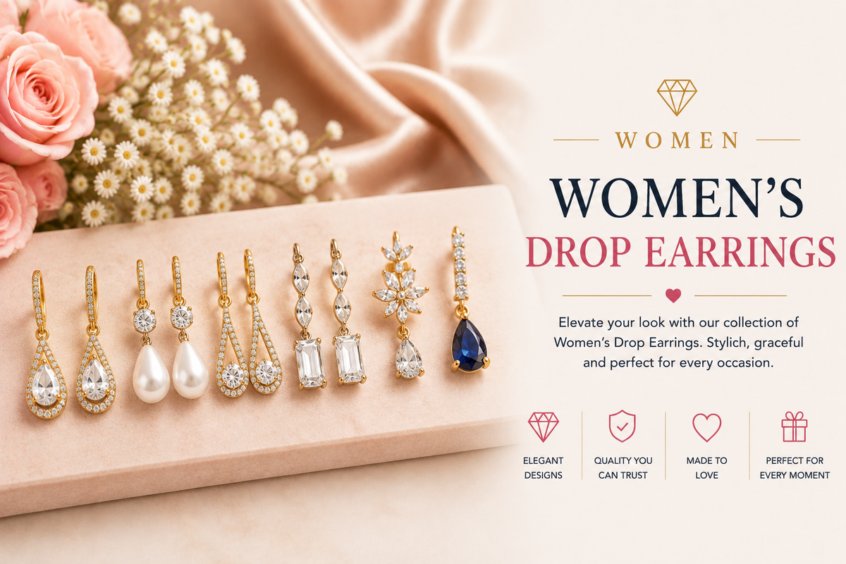 Women's drop earrings featuring elegant crystal, pearl and blue gemstone designs in gold-tone settings displayed on a blush jewelry tray
